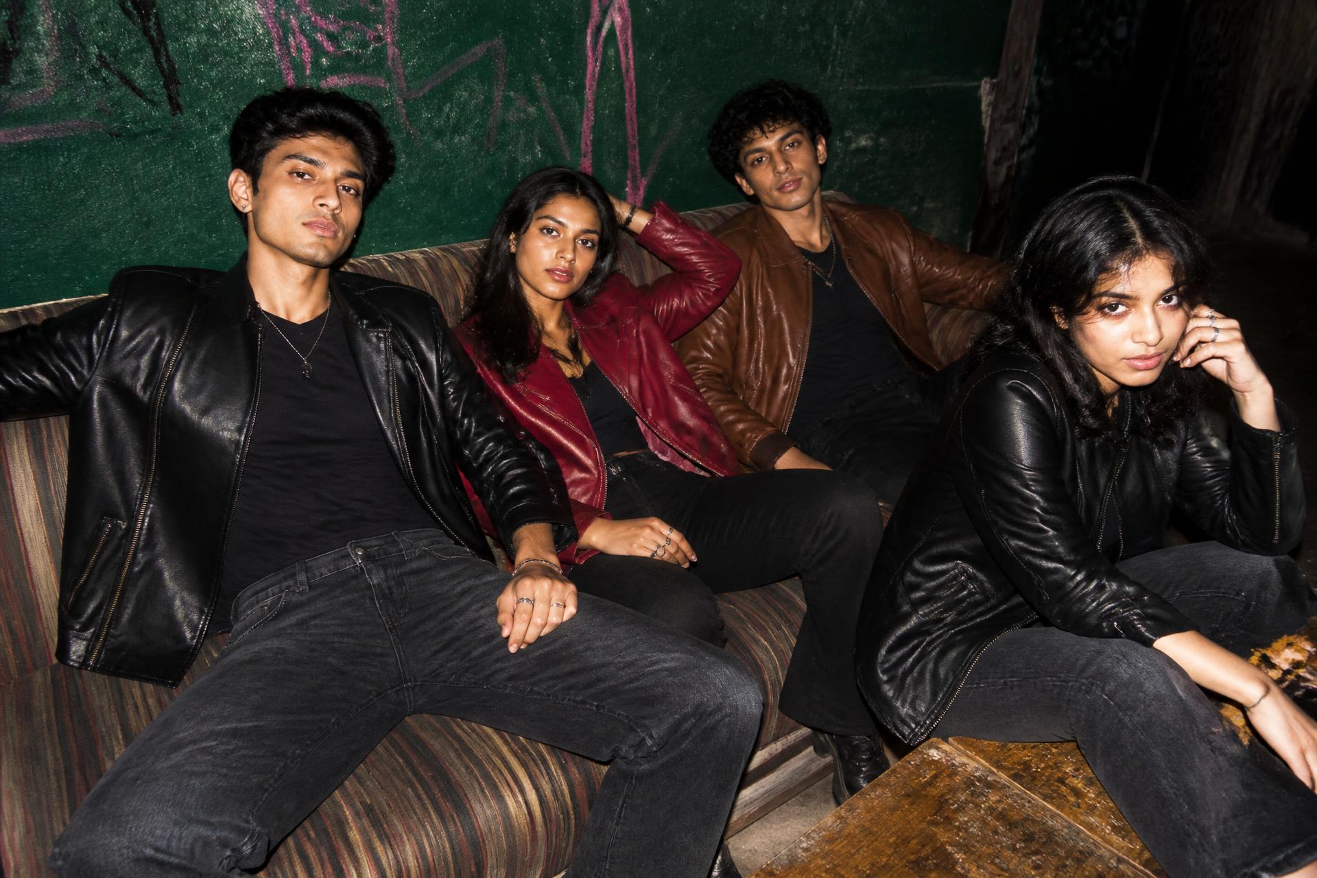 Four JAKROCK models — two men and two women — in leather jackets